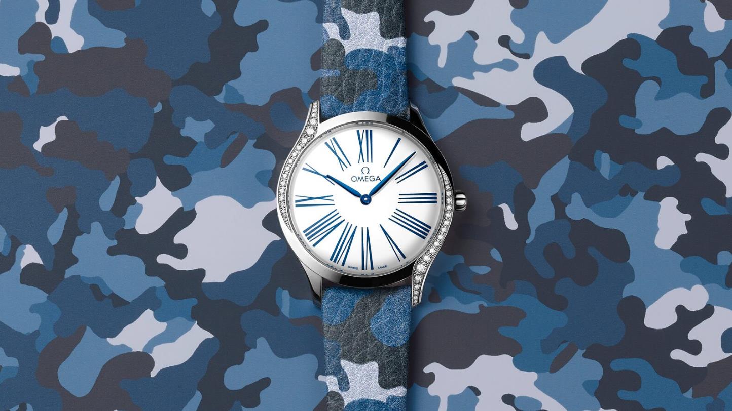 The stainless steel replica watches have blue straps.